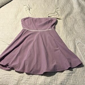 Purple mini dress with flowy skirt and bow spaghetti straps